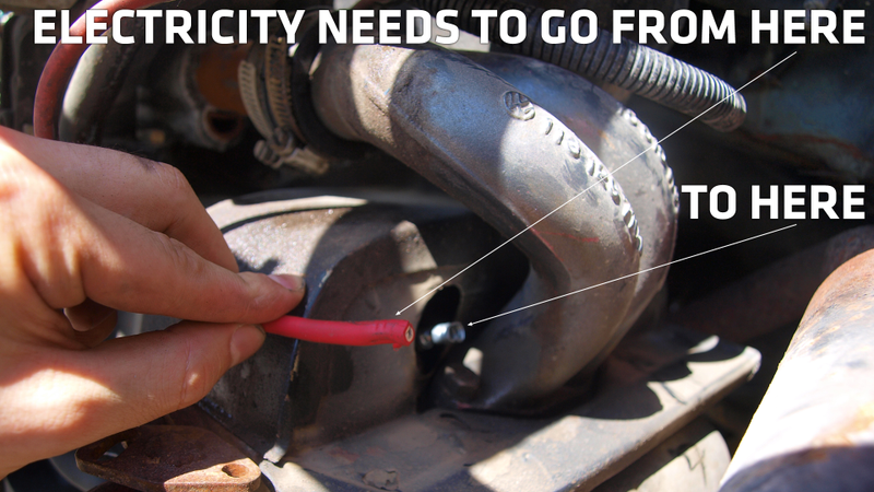 Illustration for article titled How To Fix A Broken Spark Plug With Teeth, Tape, And Jumper Cables